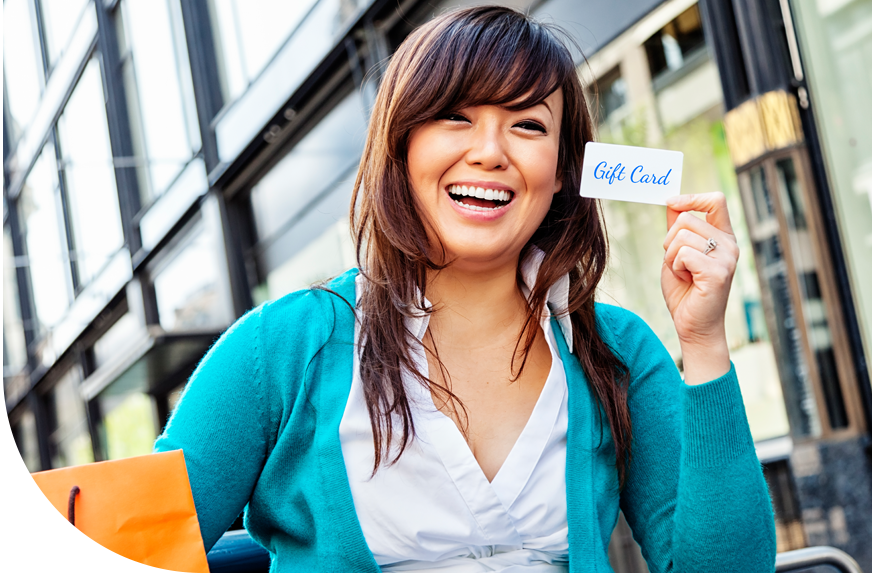 gift card program_woman smiling holding gift card